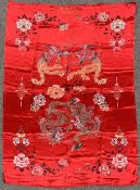 A vintage Chinese woven silk panel by Hang Znuo Silk, in vibrant crimson, with machine embroidery