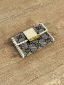 A 'Gucci' monogram key wallet in brown woven logo fabric pattern with beige faux leather trim and