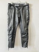 A pair of ZAF Bikerwears leather trousers, featuring adjustble cross lacing from the hips down the