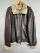 A vintage sheepskin flying jacket circa 1960-70s, in dark brown with taupe shearling inner