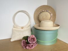 A 20th century vintage cream raffia bag with staement handle, two womens straw summer hats, pink