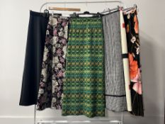 Assorted 1970s maxi skirts to include woven vibrant green mohair style, black and white houndstooth,