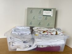 A quantity of 20th century vintage tablecloths and furniture protectors, to include damask, white