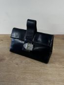 A vintage structural statement evening bag with minimalist prism construction, in smooth black
