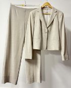 A vintage Armani Collezioni suit, 100% Pure New Wool in an ivory/black linen weave fabric, comprises