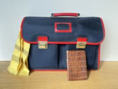 Vintage retro messenger satchel in navy canvas with red trim, along with a tan croc leather