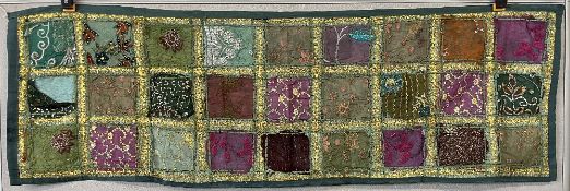An vintage Indian beaded and embroidered tapestry, table runner or hanging, with a patchwork /