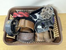 Assorted vintage statement belts to include brown woven leather, croc, red plaited, studded,