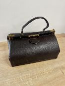 A mid-century vintage doctor's style handbag in brown reptile textured leather, gold metal or