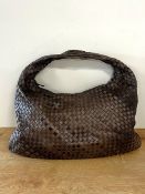 A 'Bottega Veneta' woven hobo bag in chocolate brown leather, antique brass hardware, camel suedette