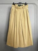 A 1970s Ralph Lauren pleated A-line skirt with hip pockets and extra wide belt loops, in camel
