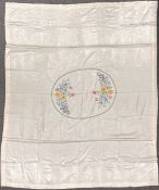 A 20th century vintage bedspread in heavyweight champagne satin with central medallion of floral