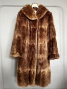 Two early-mid 20th century fur coats, comprising a Bourne & Hollingsworth mauve-taupe 3/4 length