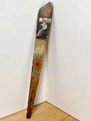 An antique treen corset stay, originating in Stockholm, hand painted to depict a red rose and a lady