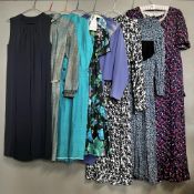 Assorted 1970s womens' wear in a range of blue, purple and patterned fabrics, to include Jaeger navy
