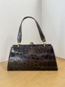A 20th century vintage 'London Made England' frame handbag in chocolate brown genuine crocodile