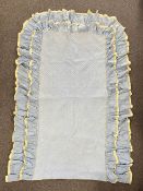 A pair of 20th century vintage quilted single-bed covers in sky blue cotton with yellow cream