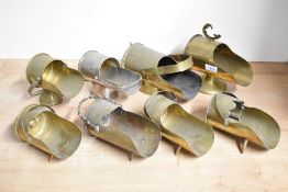 A group of eight World War I and II adapted French, British and German trench art shell cases,