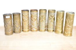 Four pairs of Pre World War I, WWI & WWII French, German and American brass trench art shell