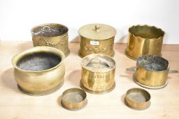 A group of eight German and British World War I trench art shell cases, adapted and pin trays,