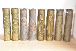 Four pairs of French (and USA stamped) brass 75DEC world War I trench art shell cases, each embossed