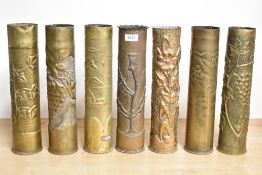 A group of seven World War I/II brass trench art shell cases, mainly French 75DEc on marked