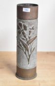 A pre World War I French brass trench art shell case, embossed with stylised foliate motif against a