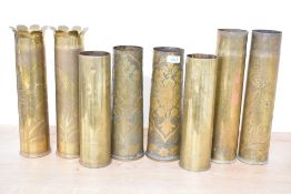 Four pairs of fine British and French World war I brass trench art shell cases, each finely hand