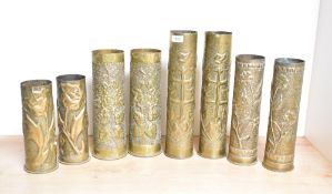 Four pairs of French, British and German World War I brass trench art shell cases, each with