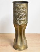 An American World War II brass trench art Howitzer shell, decorated with a lion rampant and stylised