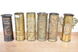 A group of six French and German World Wear I brass trench art shell cases each with embosses,
