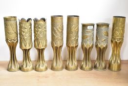 Three pairs of World War I French brass 75DEC trench art shell cases, each embossed and hand