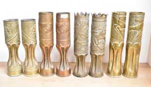 Four pairs of French World War I 75DEC brass and patinated brass trench art shell cases, embossed