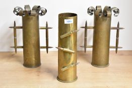 A near pair of French World War I 75Dec trench art shell cases, each with scrolled crowns over