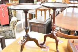 Two (not a pair) period style wine/occasional tables, both having turned columns and triple splay