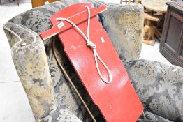 A vintage painted wooden childs sledge/toboggan, length approx. 79cm