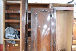A Victorian mahogany triple wardrobe/linen press, currently dismantled for ease of transport,