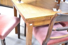 An early to mid 20th Century oak square drawer leaf table, on square legs, width approx. 84cm