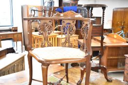 An Edwardian mahogany corner bedroom chair