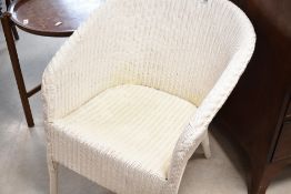 A vintage Lloyd Loom tub chair, in white