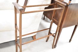 An Edwardian mahogany towel rail having line inlay decoration, height approx. 87, width 69cm