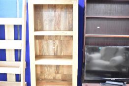 A modern light wood narrow bookshelf, dimensions approx. H175 W59 D35cm