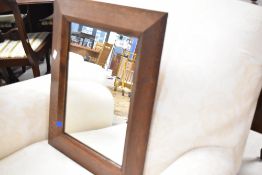 An early 20th Century oak framed wall mirror , currently with landscape hanging, approx. 52 x 42cm