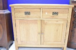 A modern golden oak sideboard of nice proportions, dimensions approx. W100 H85 D33cm