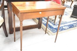 A reproduction Regency style fold over games table, approx. width 76cm, 38cm deep opening to 76cm