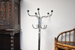 A modern chrome coat stand in the vintage style
