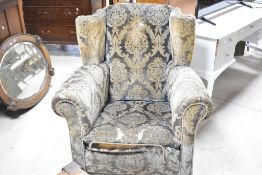 A late 19th or early 20th Century upholstery project armchair, width approx. 91cm