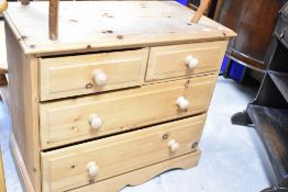 A natural pine chest of two short over two long drawers, approx. Dimensions W86 D45 H76cm