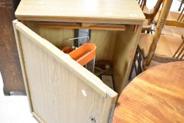 A modern (empty) sewing machine work station (on castors), dimensions approx. W61 D47 H80cm