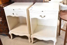 A pair of reproduction classical style painted bedside cabinets